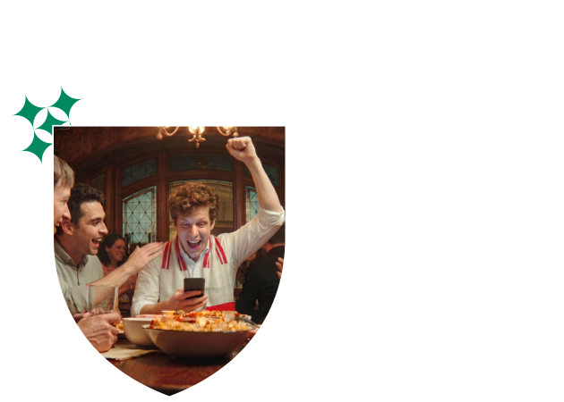 Fan holding a ticket at a venue entrance, with GeoComply's verification layer working behind the scenes